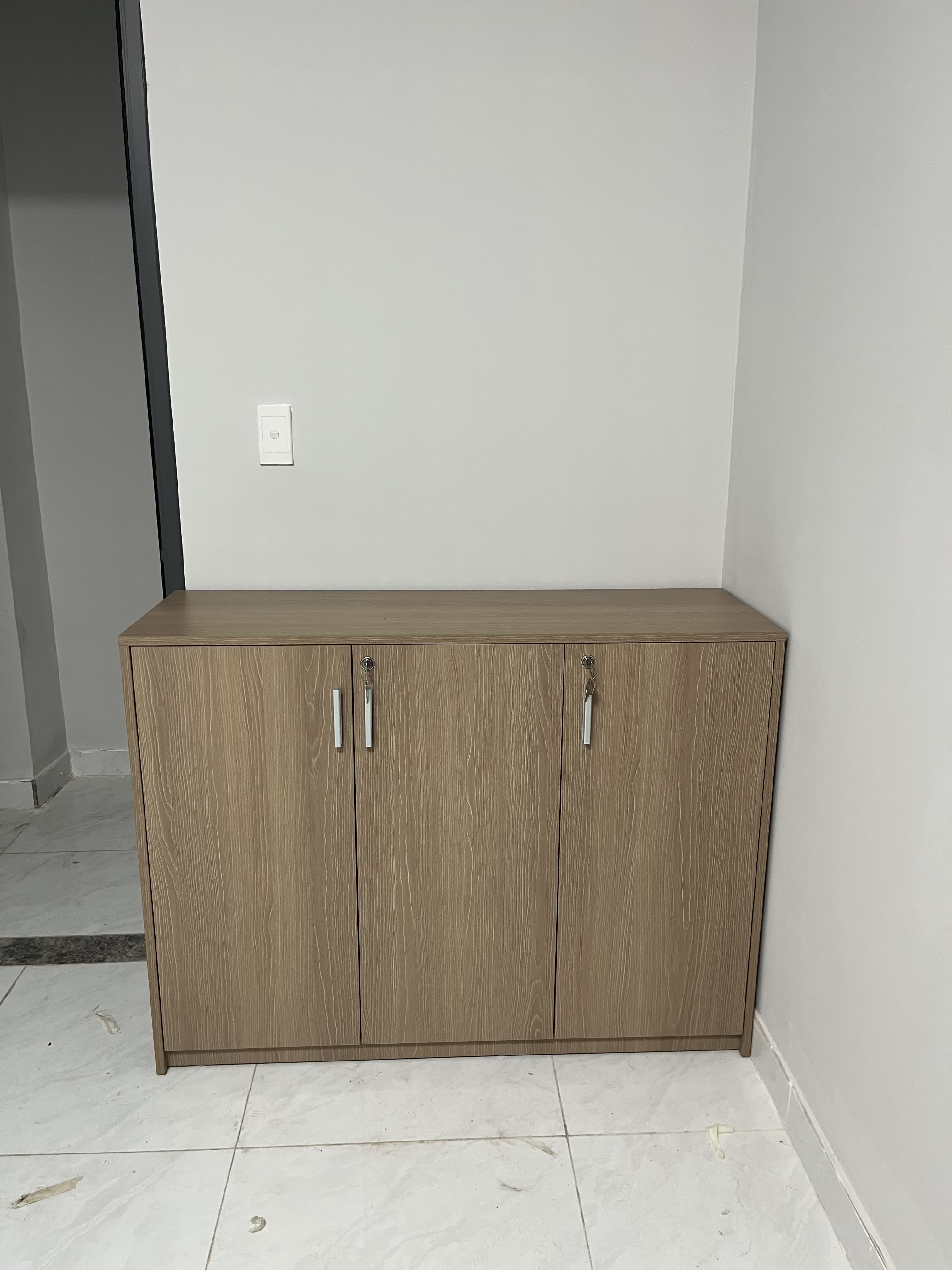 Hệ tủ phụ đồng bộ trong căn hộ giúp không gian liền mạch hơn